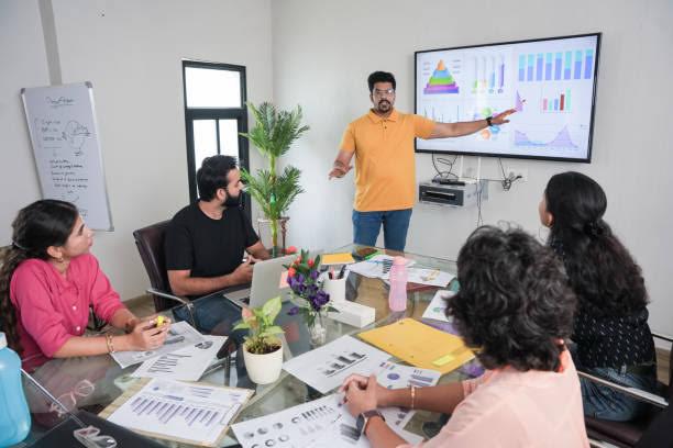 Crisis communication team planning media response in office